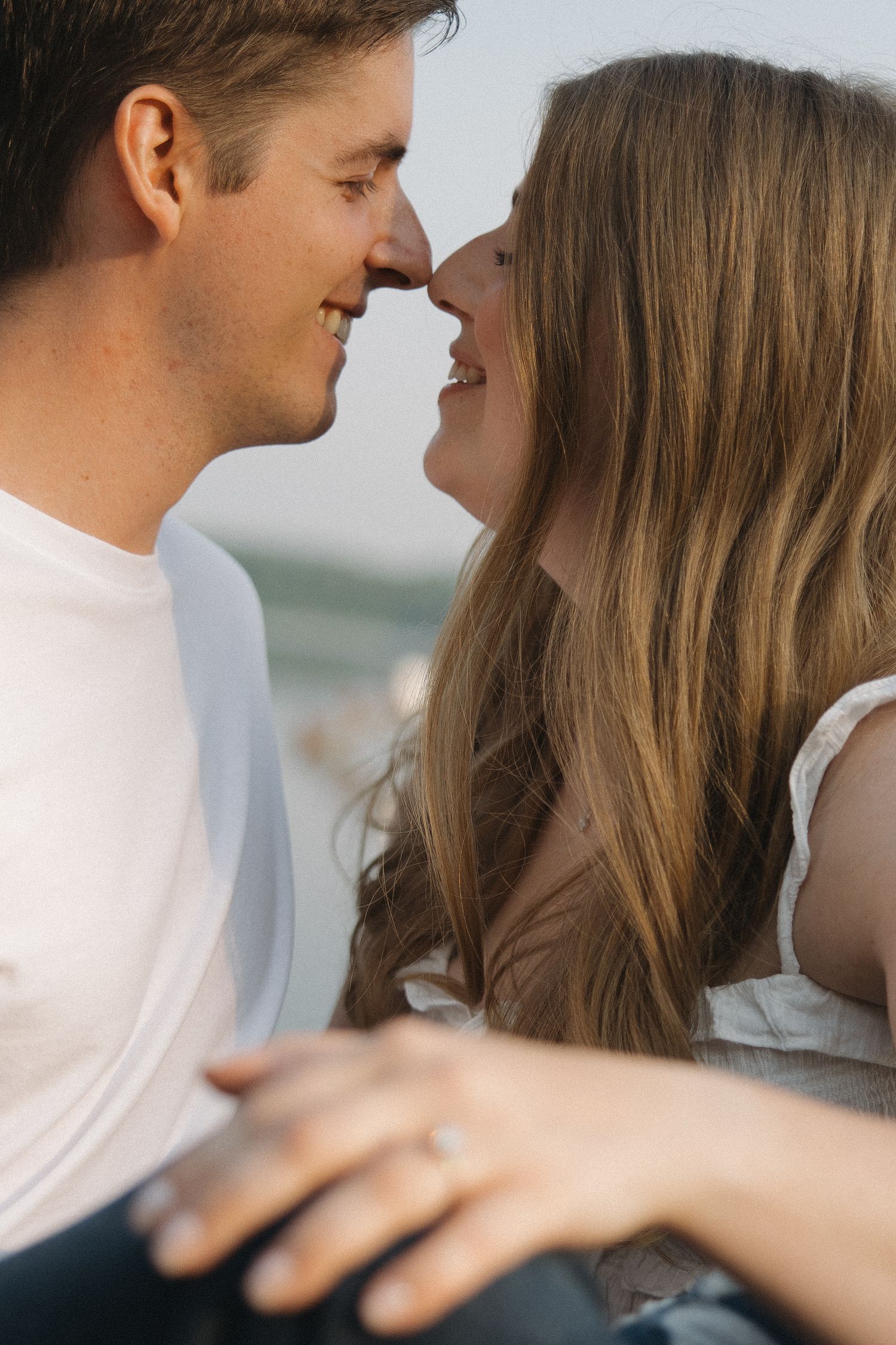 A couple sharing intimate romantic moments in a series of close-up shots with warm lighting and dreamy ambiance.