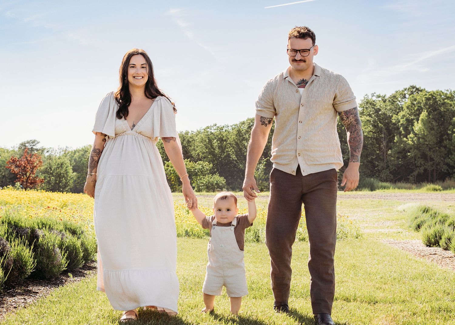 Parents walking with their baby during a South Jersey family photography session.