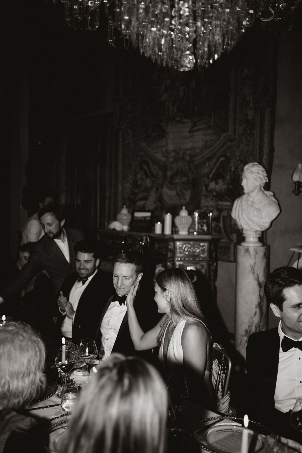 bride and groom share a secret moment at belvoir castle
