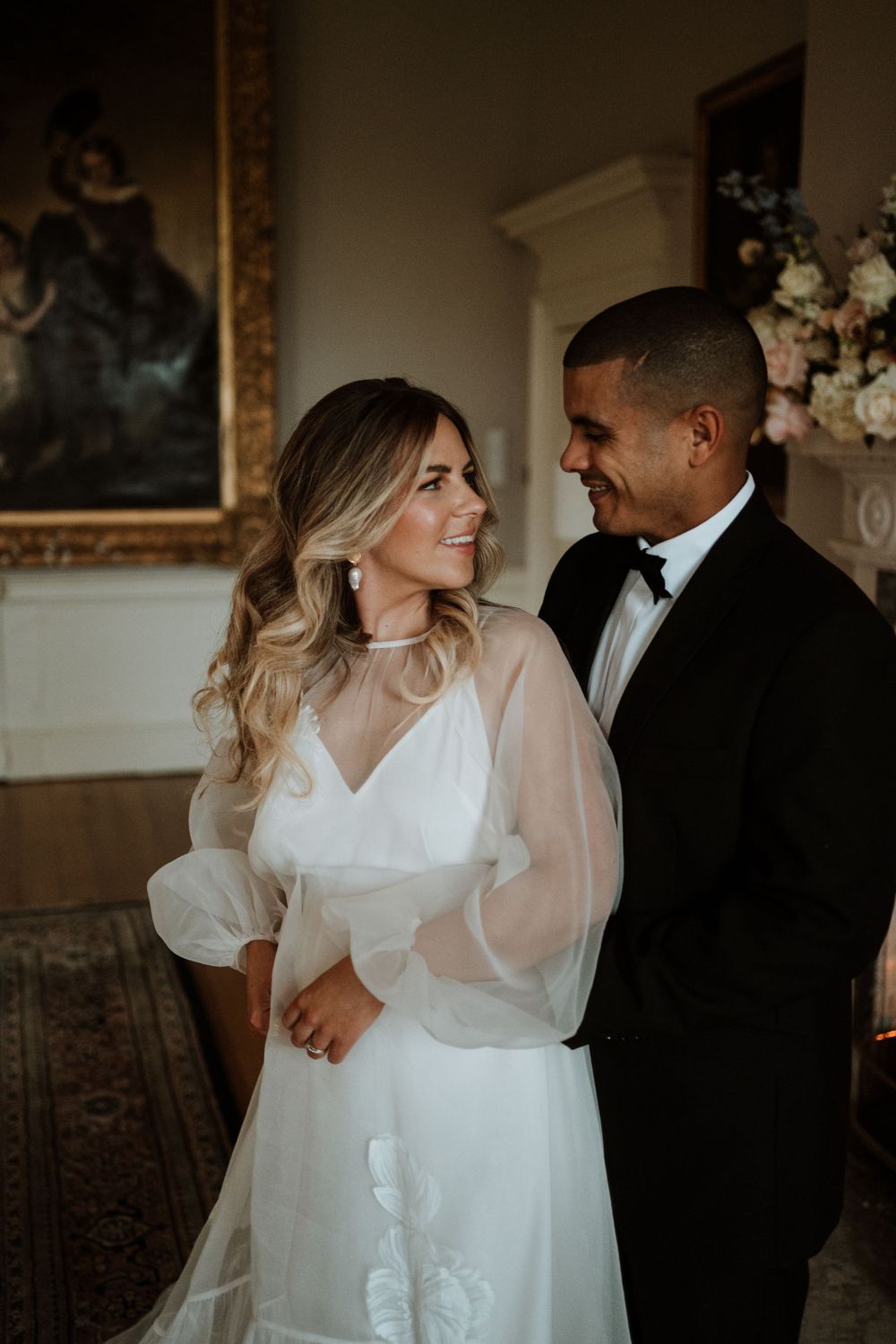 bride and groom looking at each other