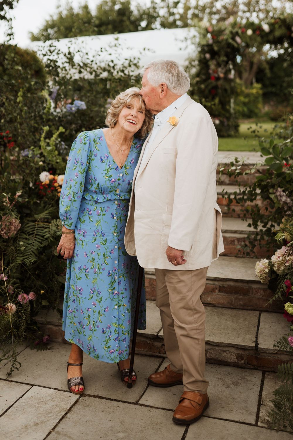 grandparents share a kiss