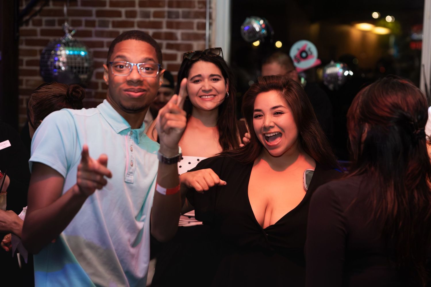 Young people having fun on the dance floor captured by Event Photographer Souther California Event Photographer.