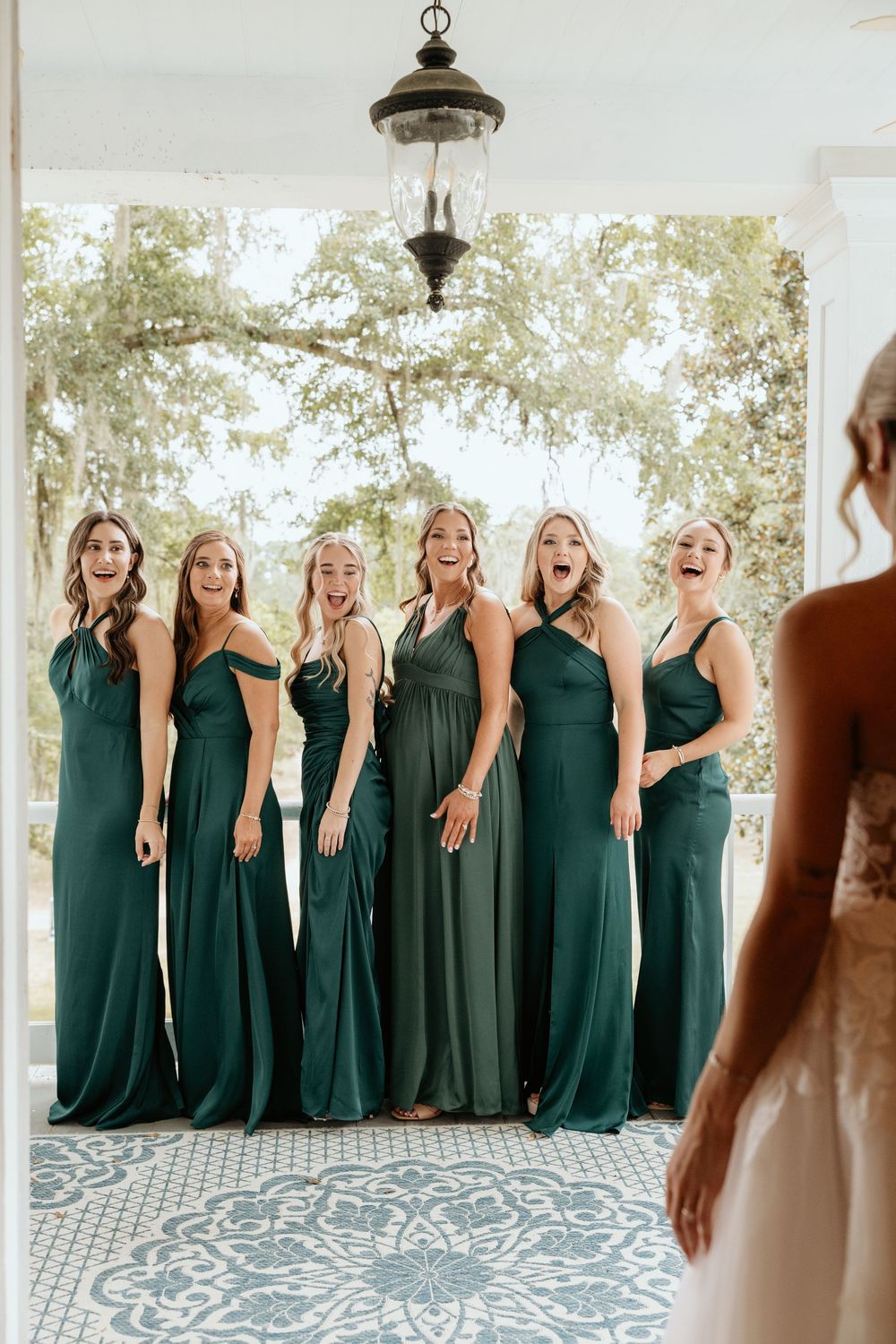 The bridesmaids first look with the bride at the southern mansion venue in Coosada, Alabama