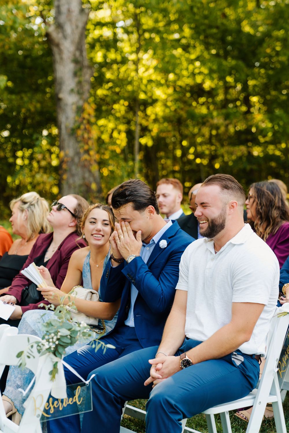 Wedding guests getting seated and having fun at The Venue On Lake Grant in Mt. Orab Ohio: Cincinnati wedding photographer