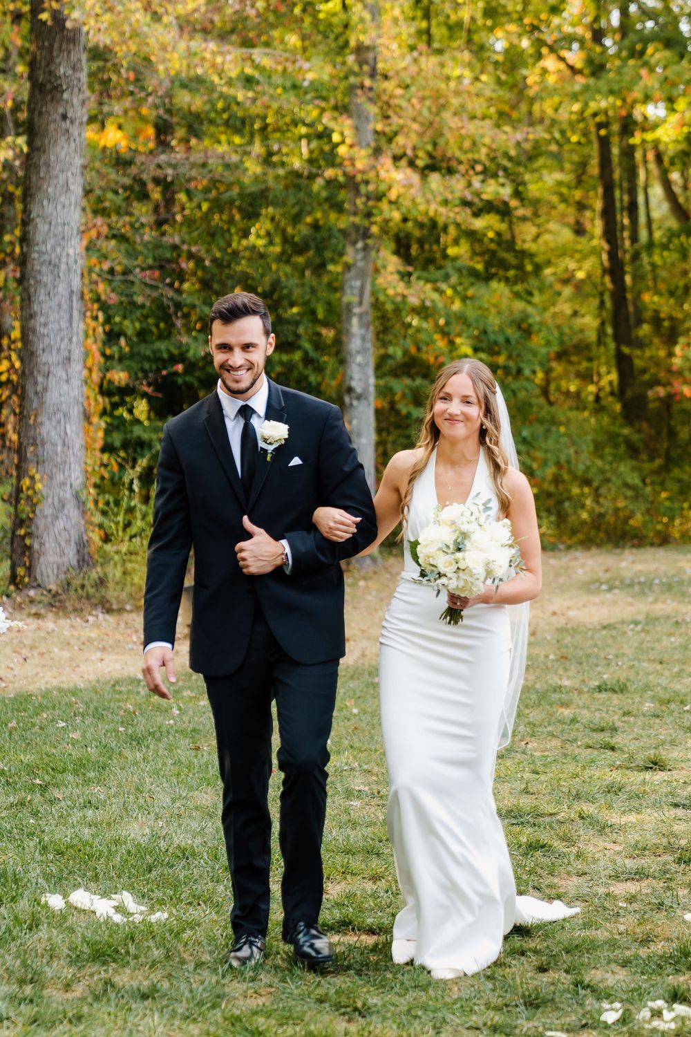 Bride walking down the aisle during the ceremony at The Venue On Lake Grant in Mt. Orab Ohio: Cincinnati wedding photographer and Engagement