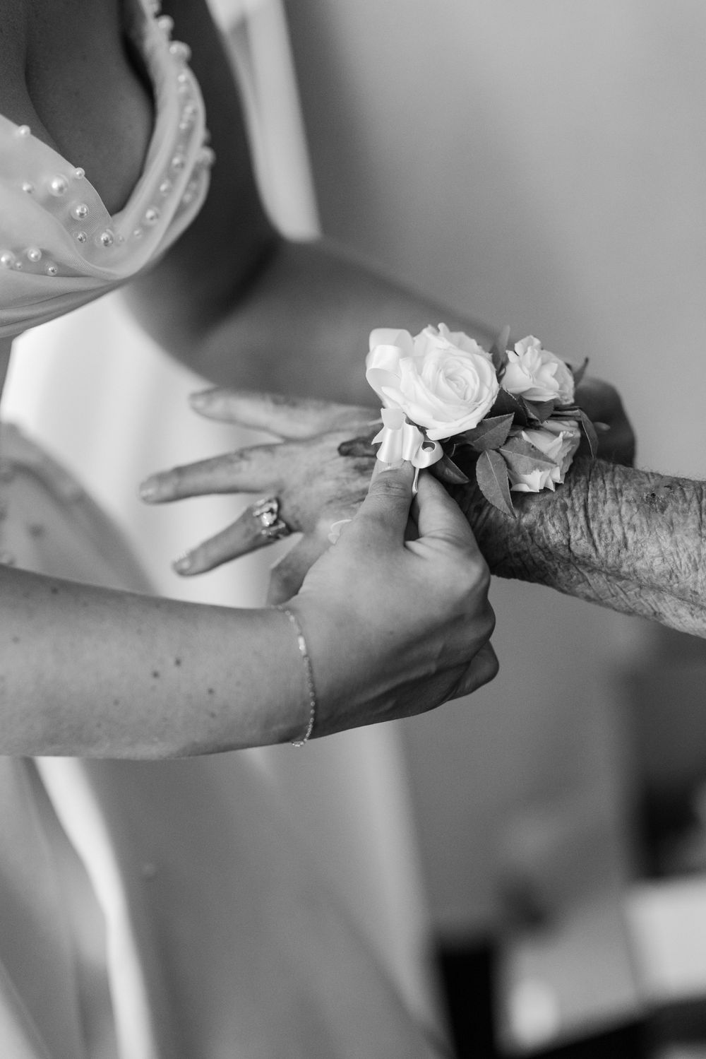 A series of black and white images showing hands holding and pouring ingredients in a cooking preparation sequence.