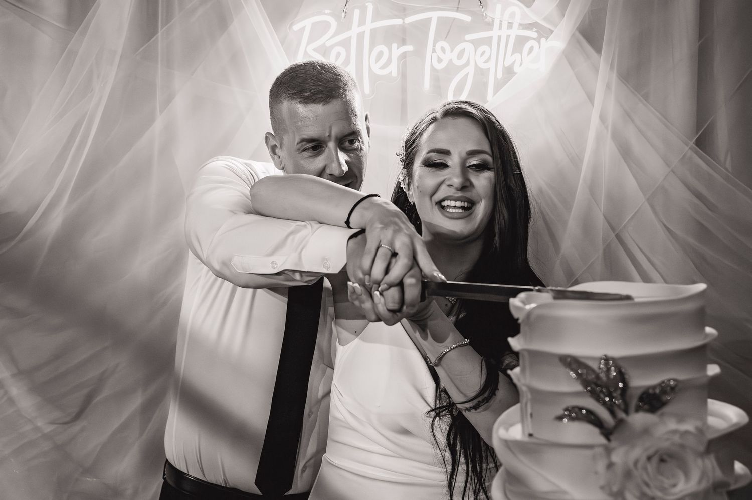 A collage of wedding moments showing a couple celebrating with cake cutting, dancing, and romantic poses against floral decor.