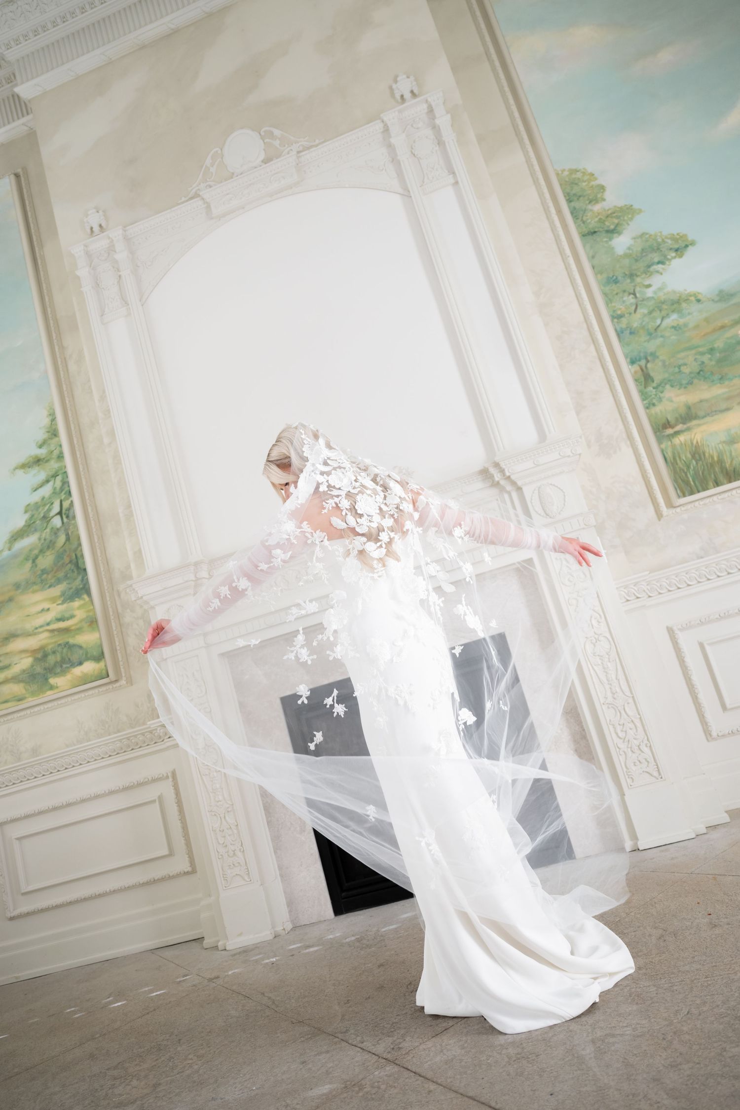 A flowing white wedding dress swirls gracefully in a sequence of artistic motion shots against an elegant interior backdrop.