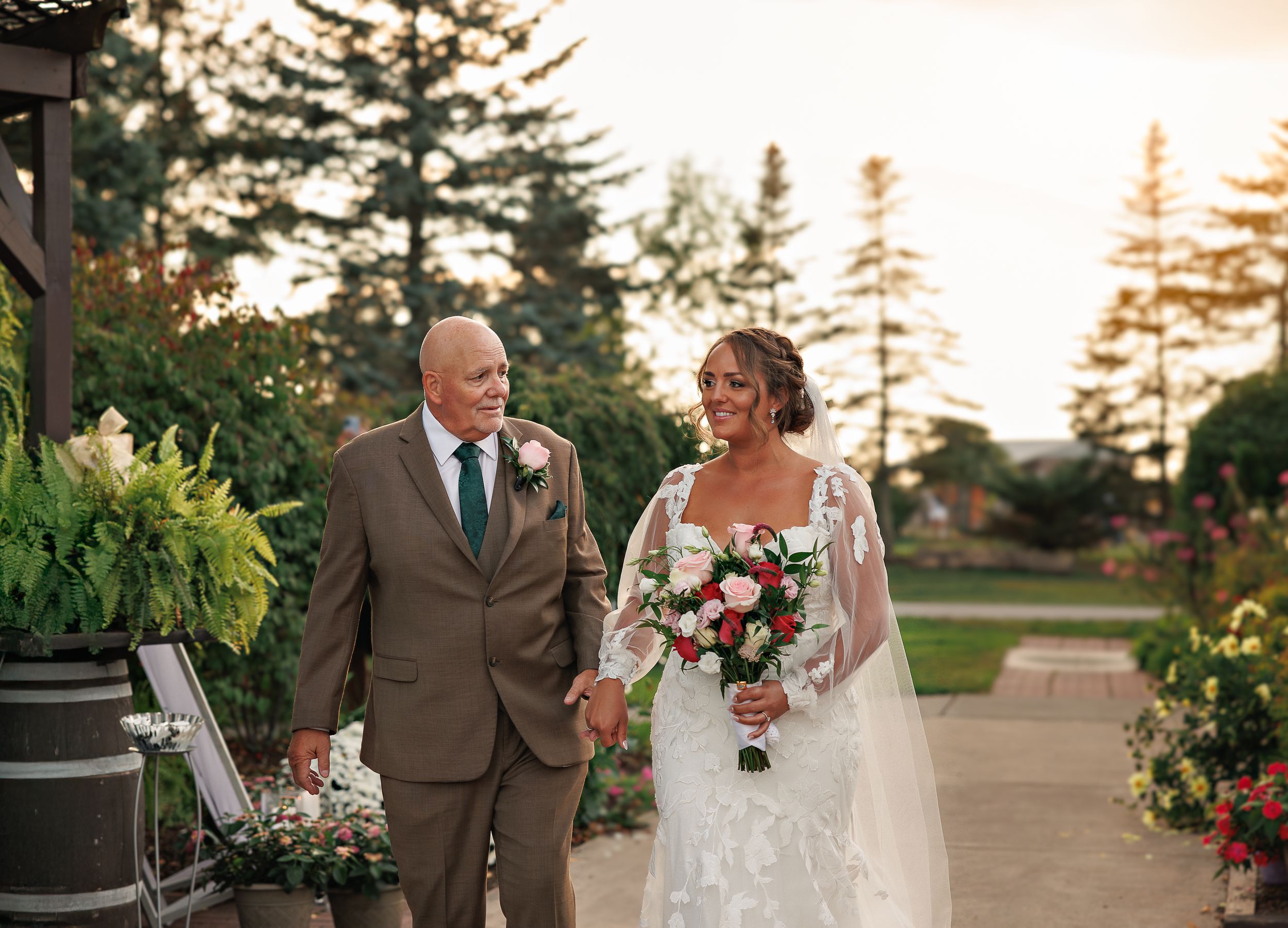 Elegant outdoor wedding ceremony photos with couples against a sunset backdrop and evergreen trees.