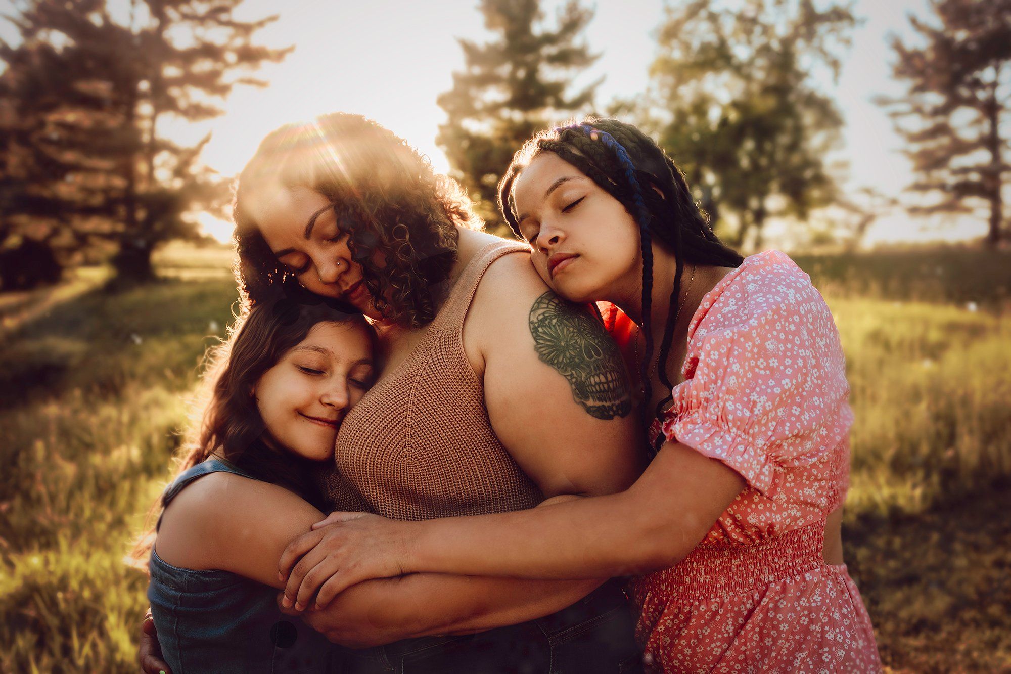 A series of intimate family moments captured during golden hour in a natural outdoor setting.