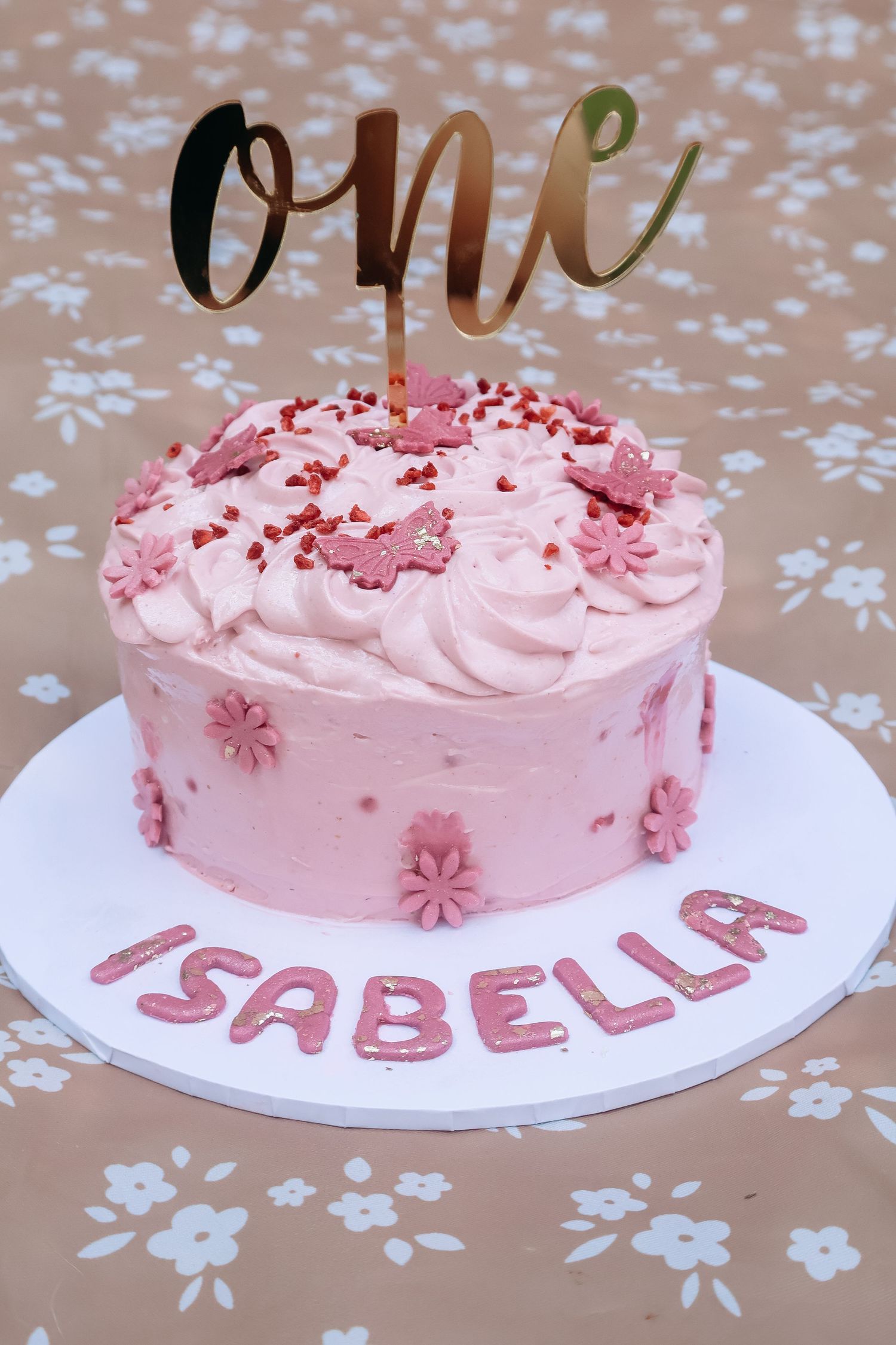 Cake smash photography documenting a first birthday filled with mess, laughter, and fun