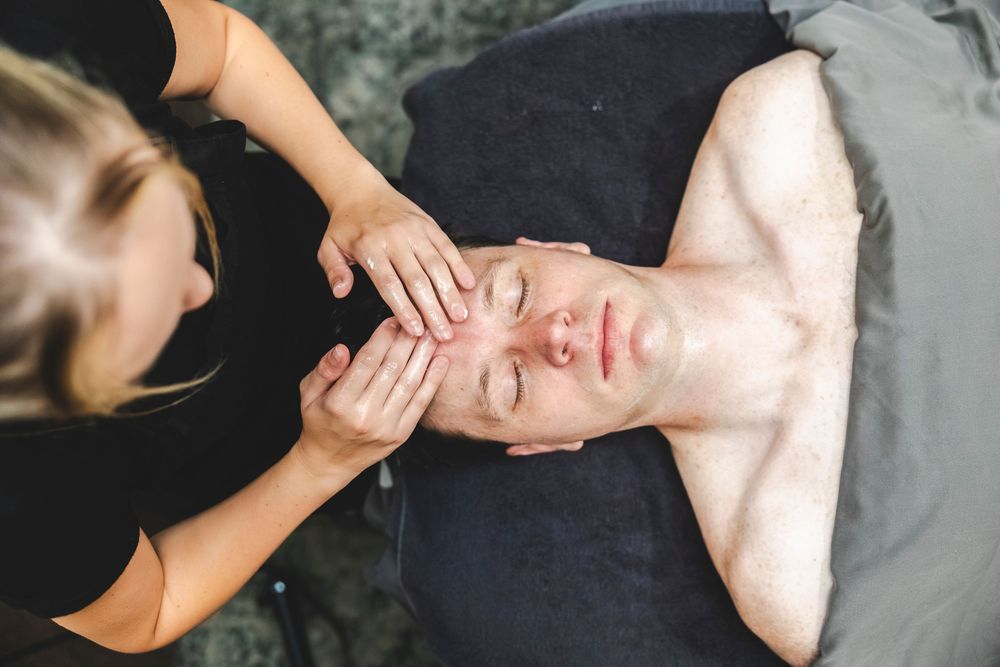 A sequence of massage therapy techniques being demonstrated on a person's neck and shoulders.