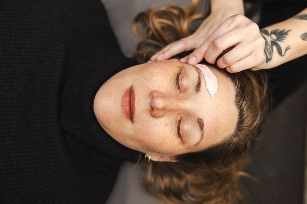 A series of massage therapy and bodywork treatment photos showing hands performing therapeutic techniques.