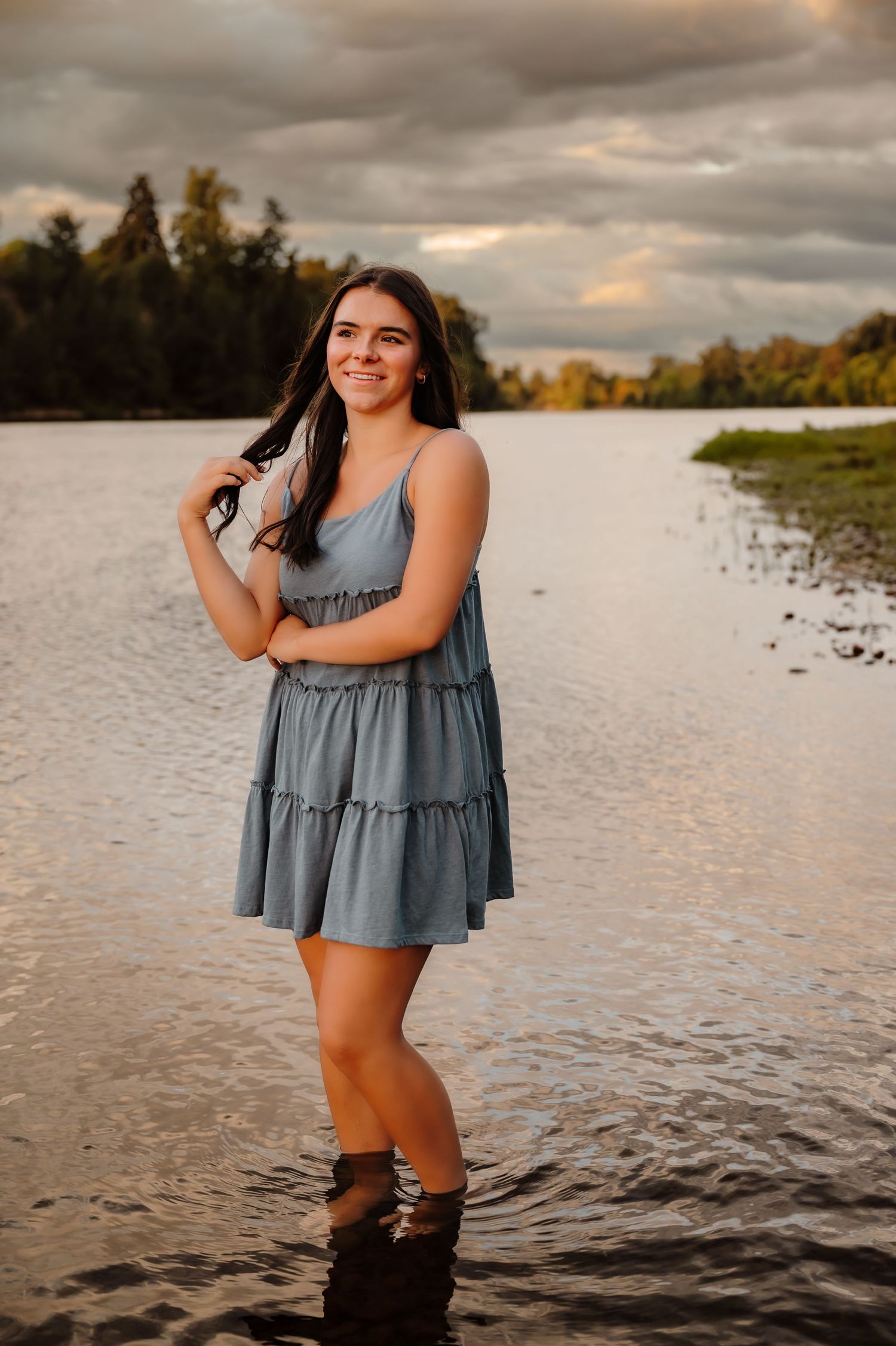 Girl by a lake