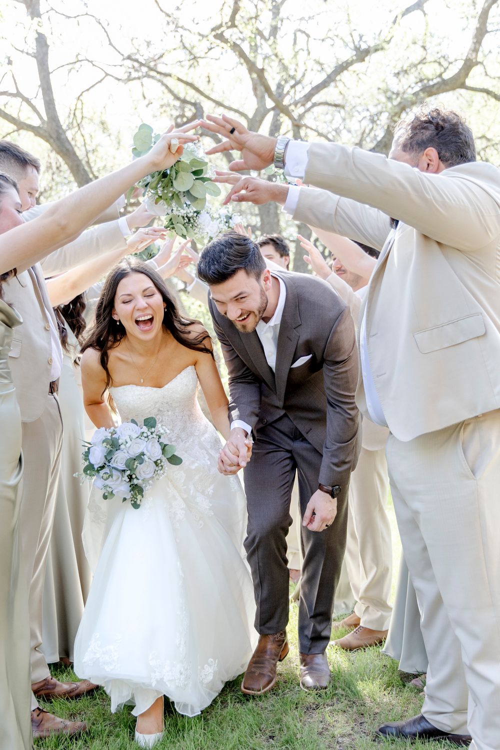Candid and emotional Dripping Springs wedding photos at sunset