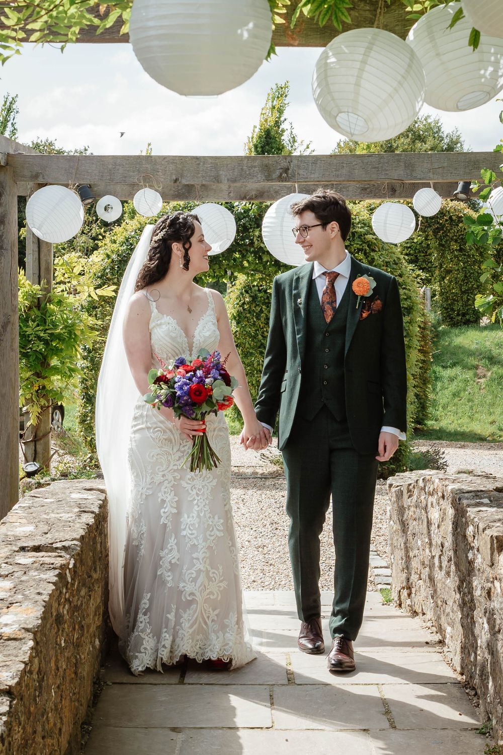 The Frogmill wedding venue Cheltenham Cotswolds Gloucestershire couple on bridge