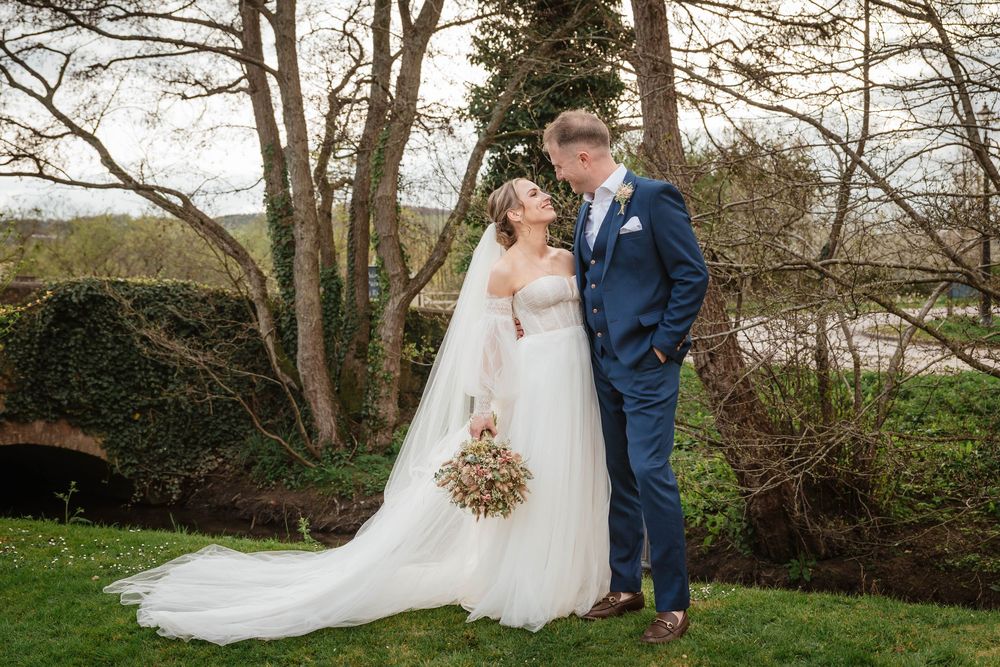 The Frogmill wedding venue Cheltenham Cotswolds Gloucestershire spring wedding pose of couple