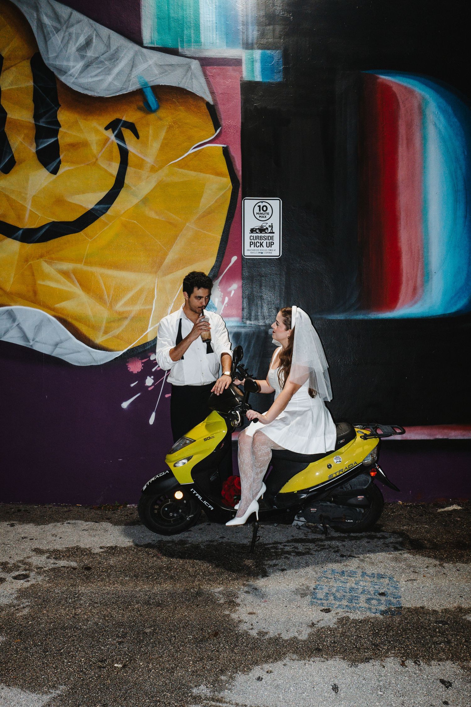 Artistic wedding portrait sequence against colorful graffiti wall showing couple dancing and embracing in urban setting.