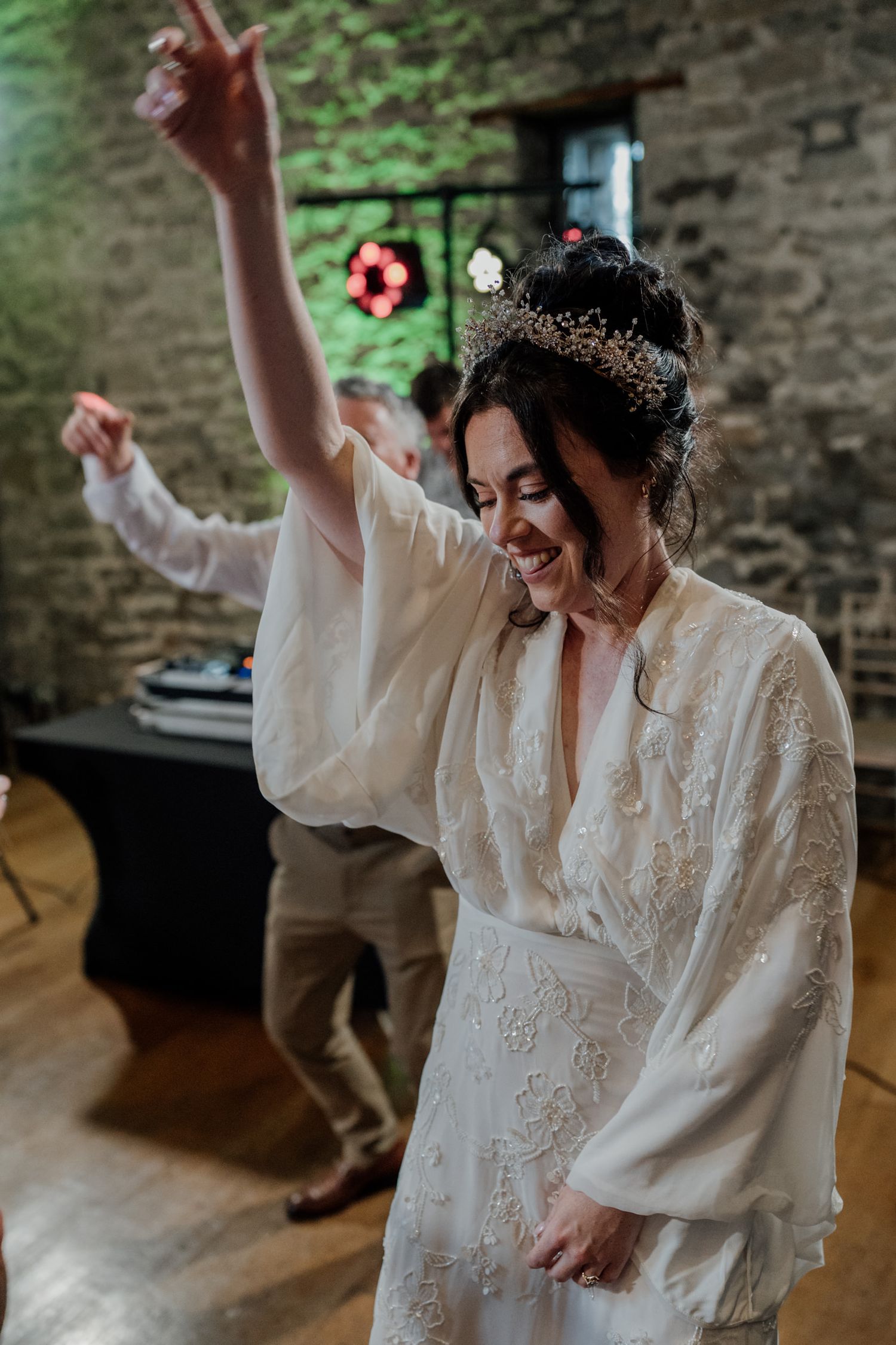 Dancing and celebration moments captured during a rustic barn wedding reception.