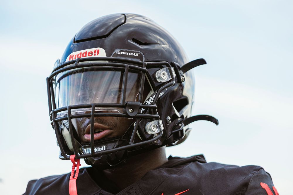 Football player looking off left screen