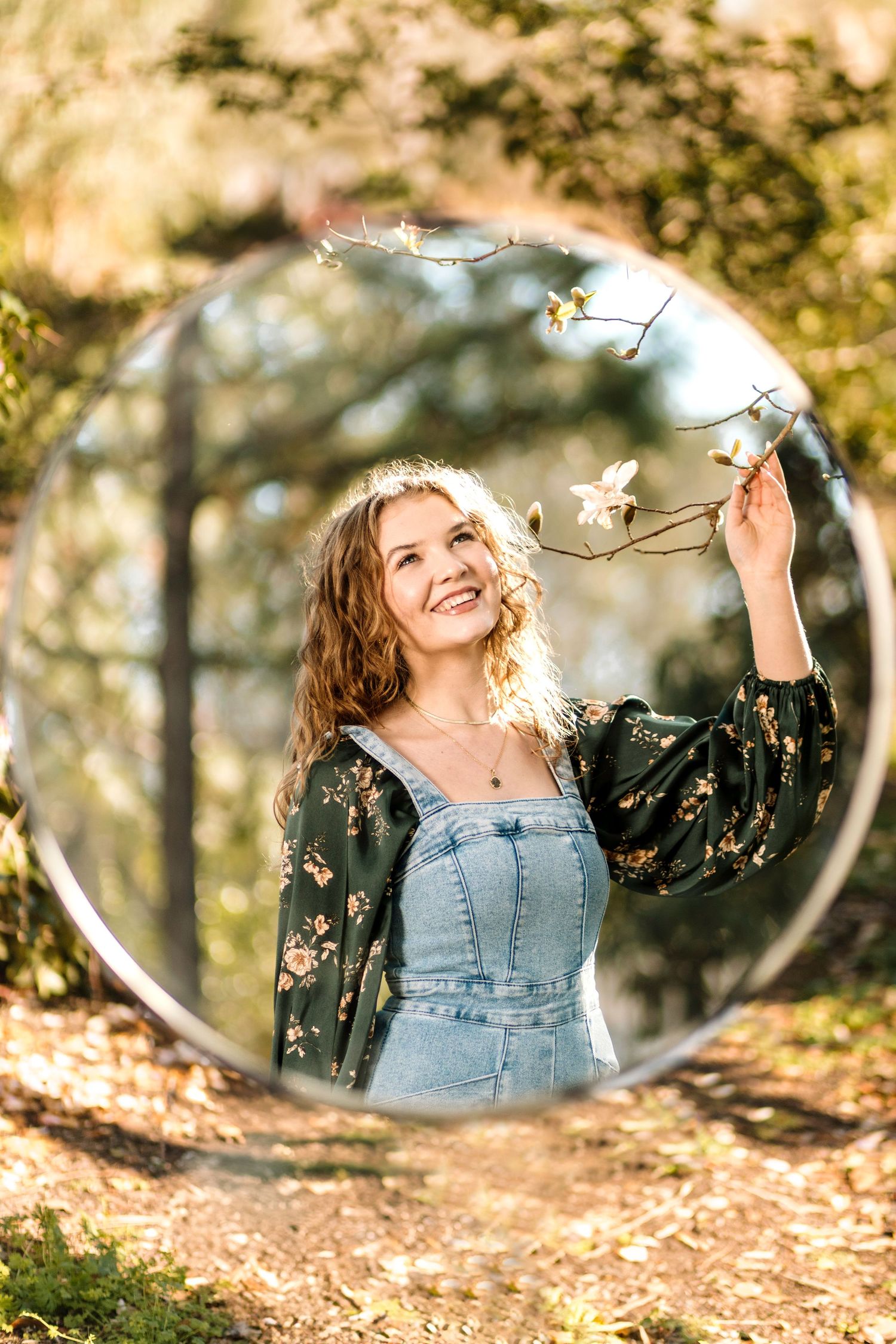 Mirror reflections capture playful outdoor portraits among autumn leaves in a creative photo series.