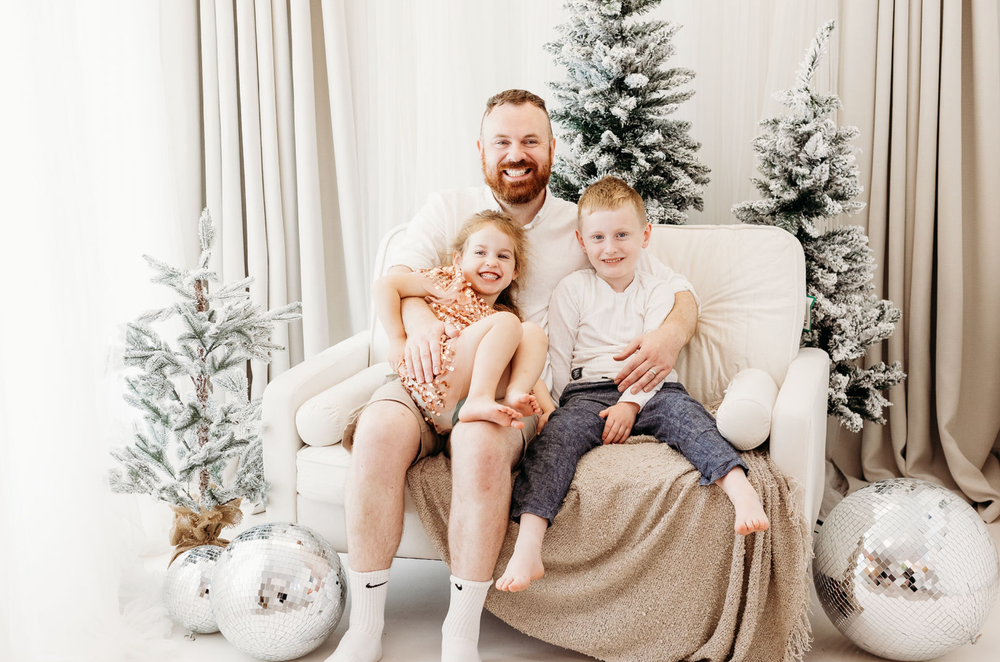 Toddler’s first Christmas mini photoshoot in Nottingham, magical portraits created at Mapperley studio with festive props.