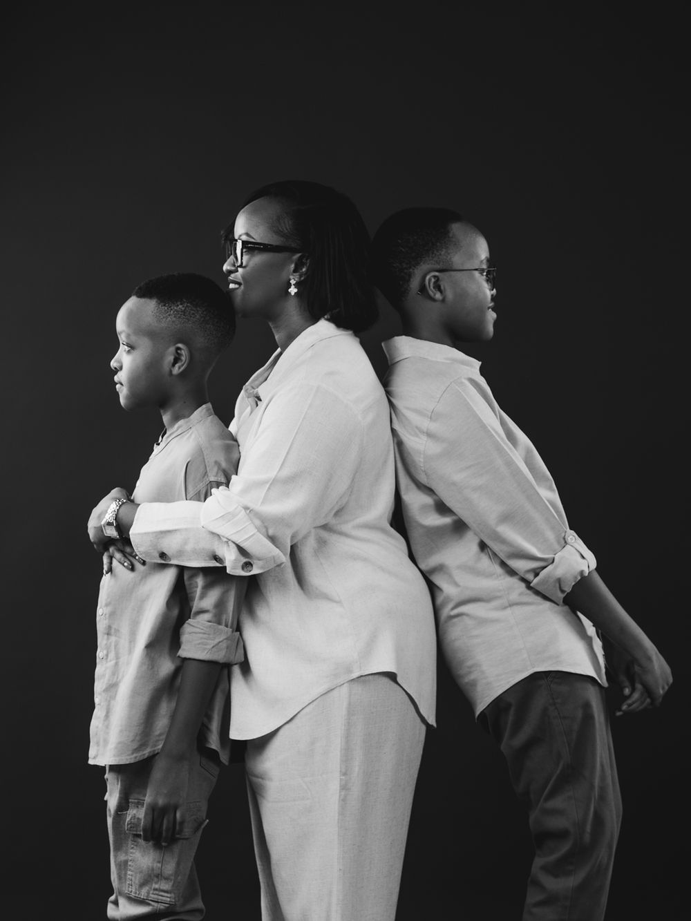 Black and white artistic sequence of four progressive frames showing emotional embrace between two subjects.