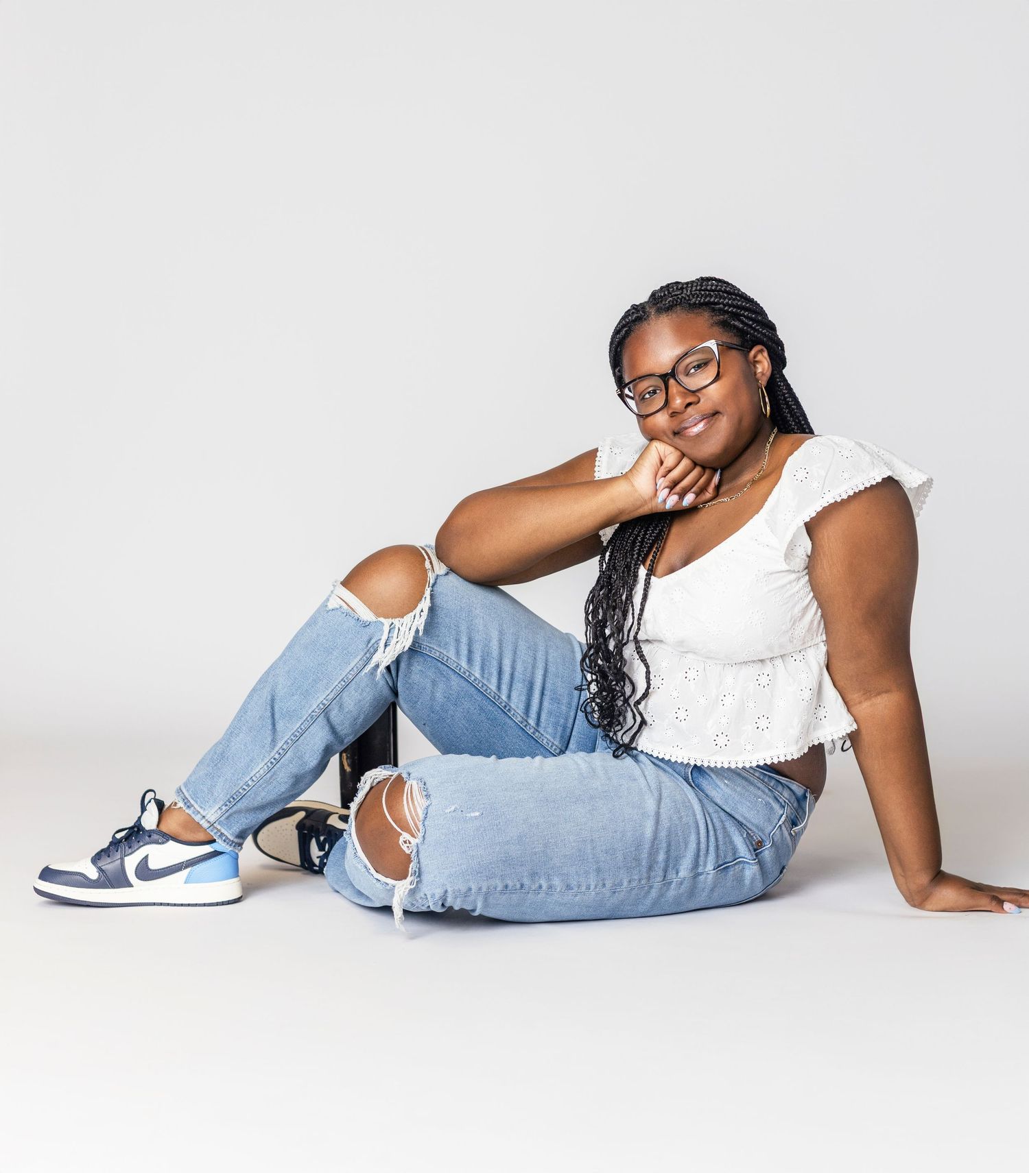 Casual lifestyle photos showing someone relaxing in jeans and sneakers on a white background.