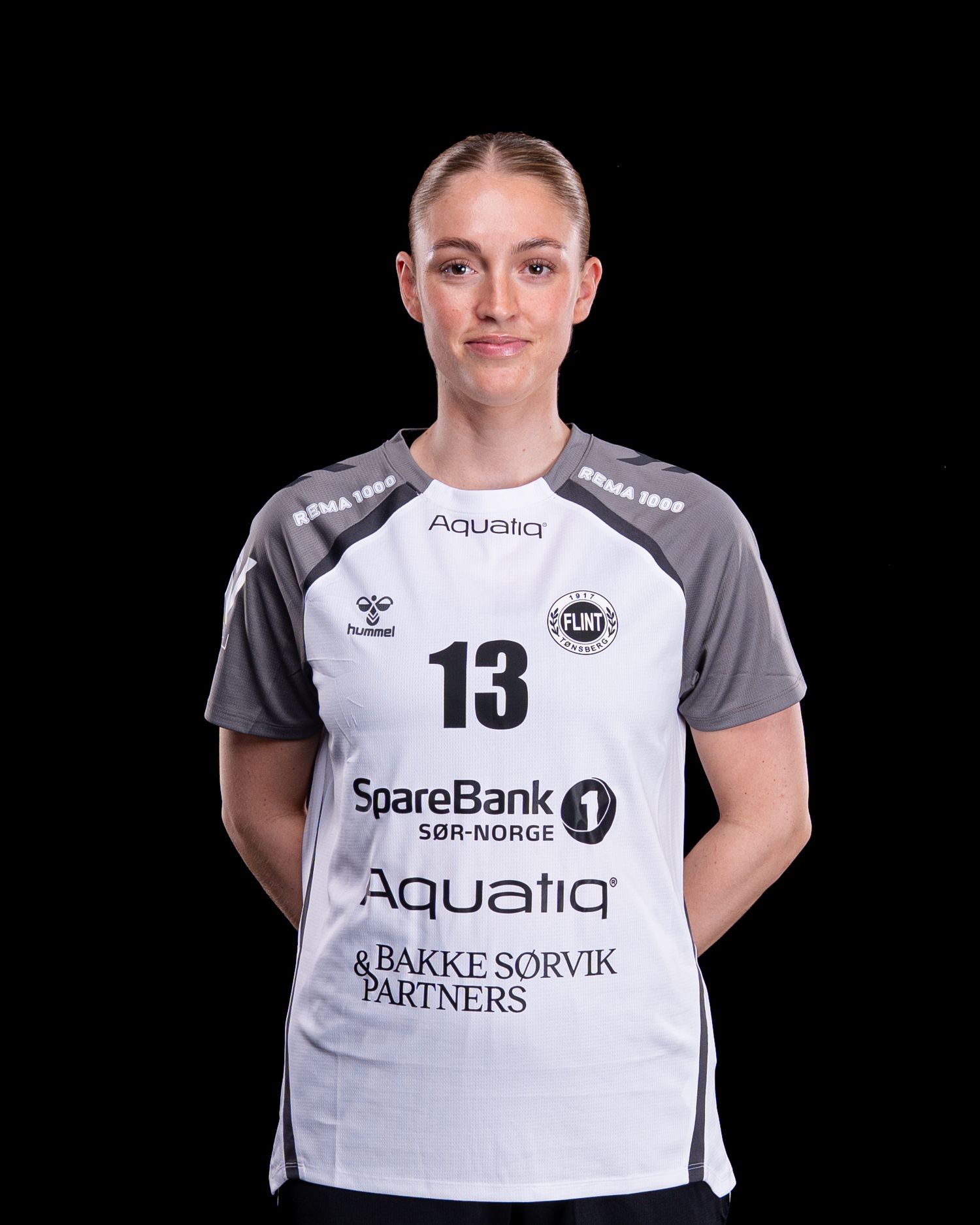 Sequence of four sports jersey images showing white and gray athletic uniforms with sponsor logos and number 13.