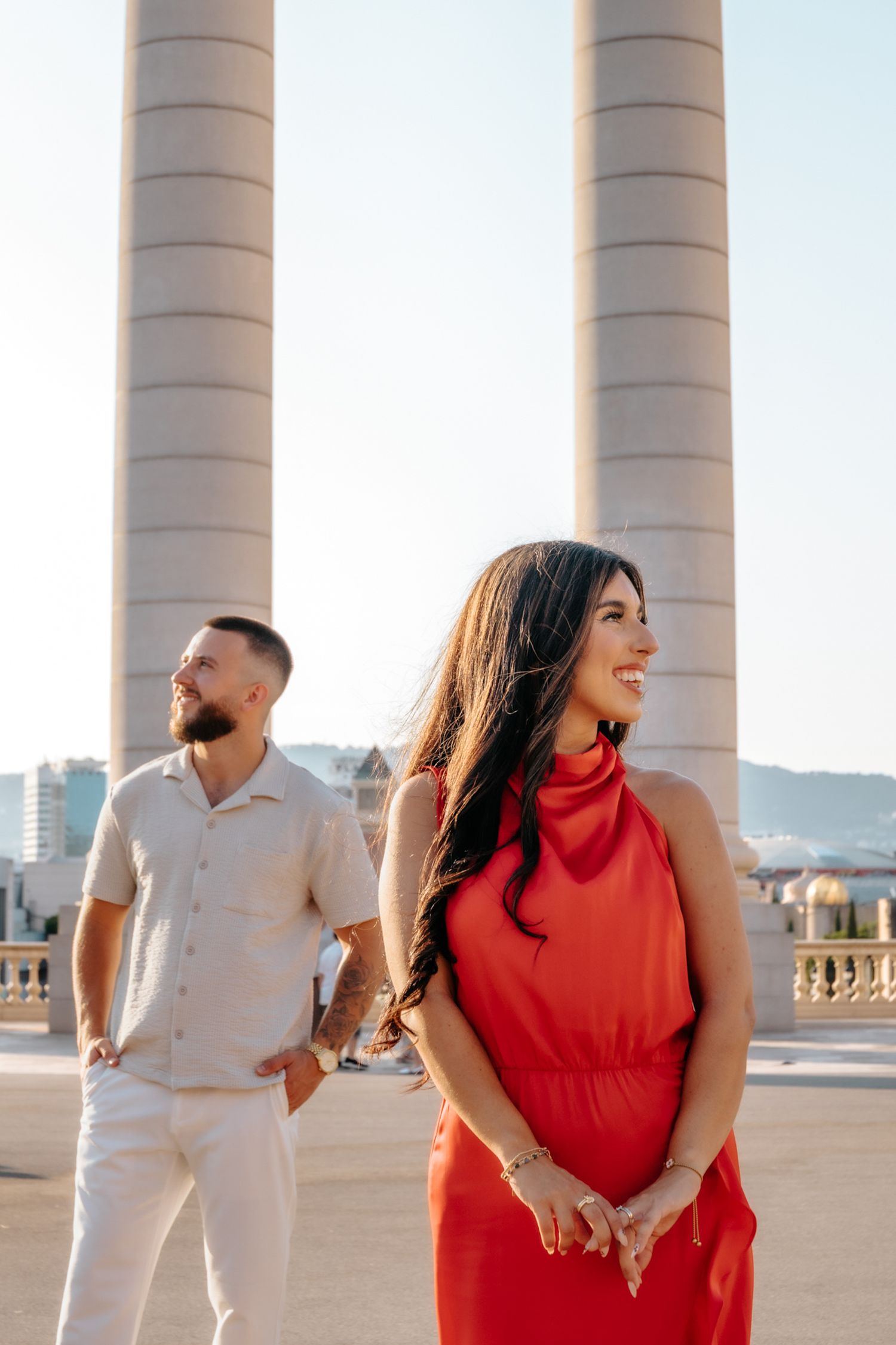 Couple laughing together in the golden afternoon light.