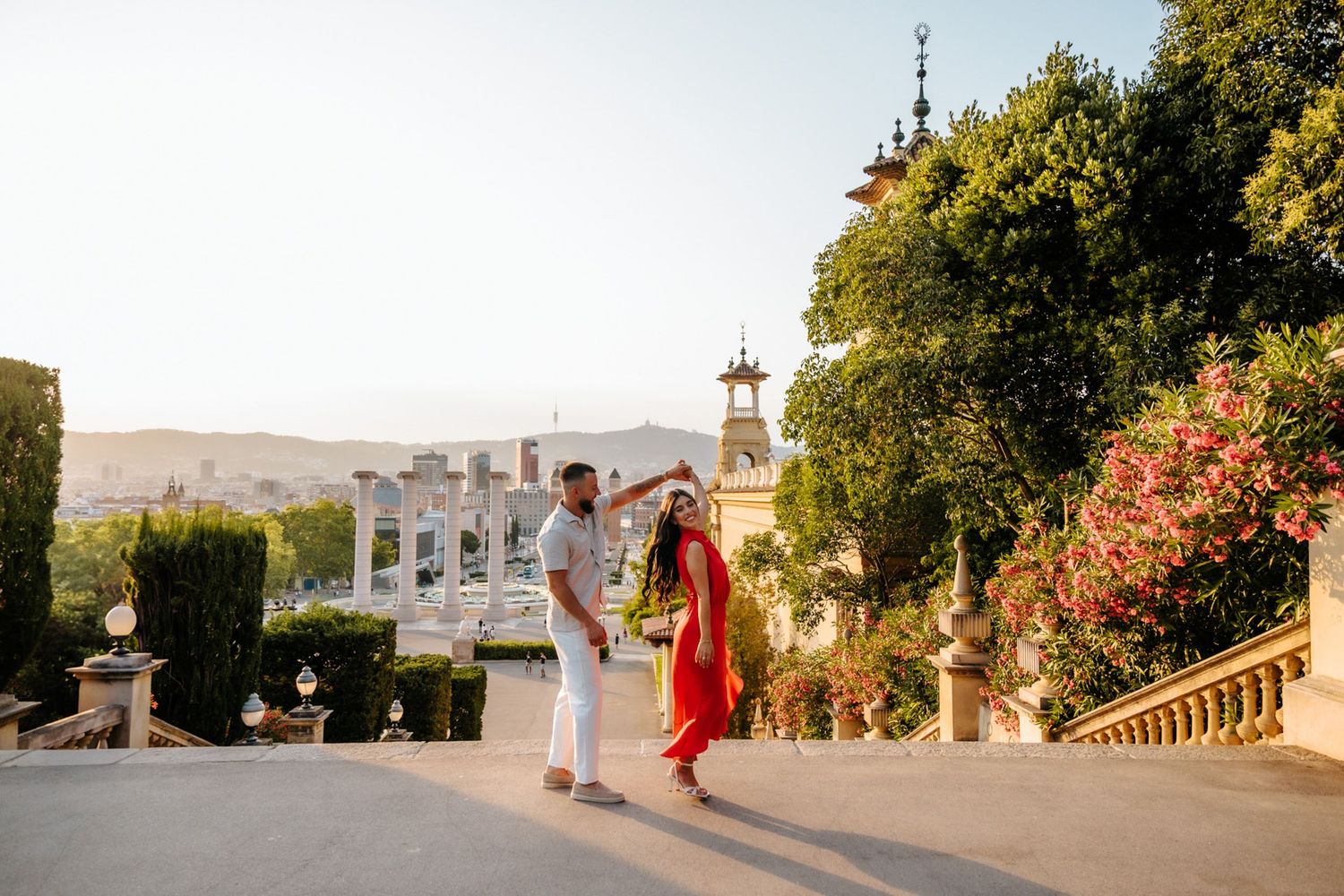 Romantic moment of Ajla & Hako holding hands on a warm summer afternoon.