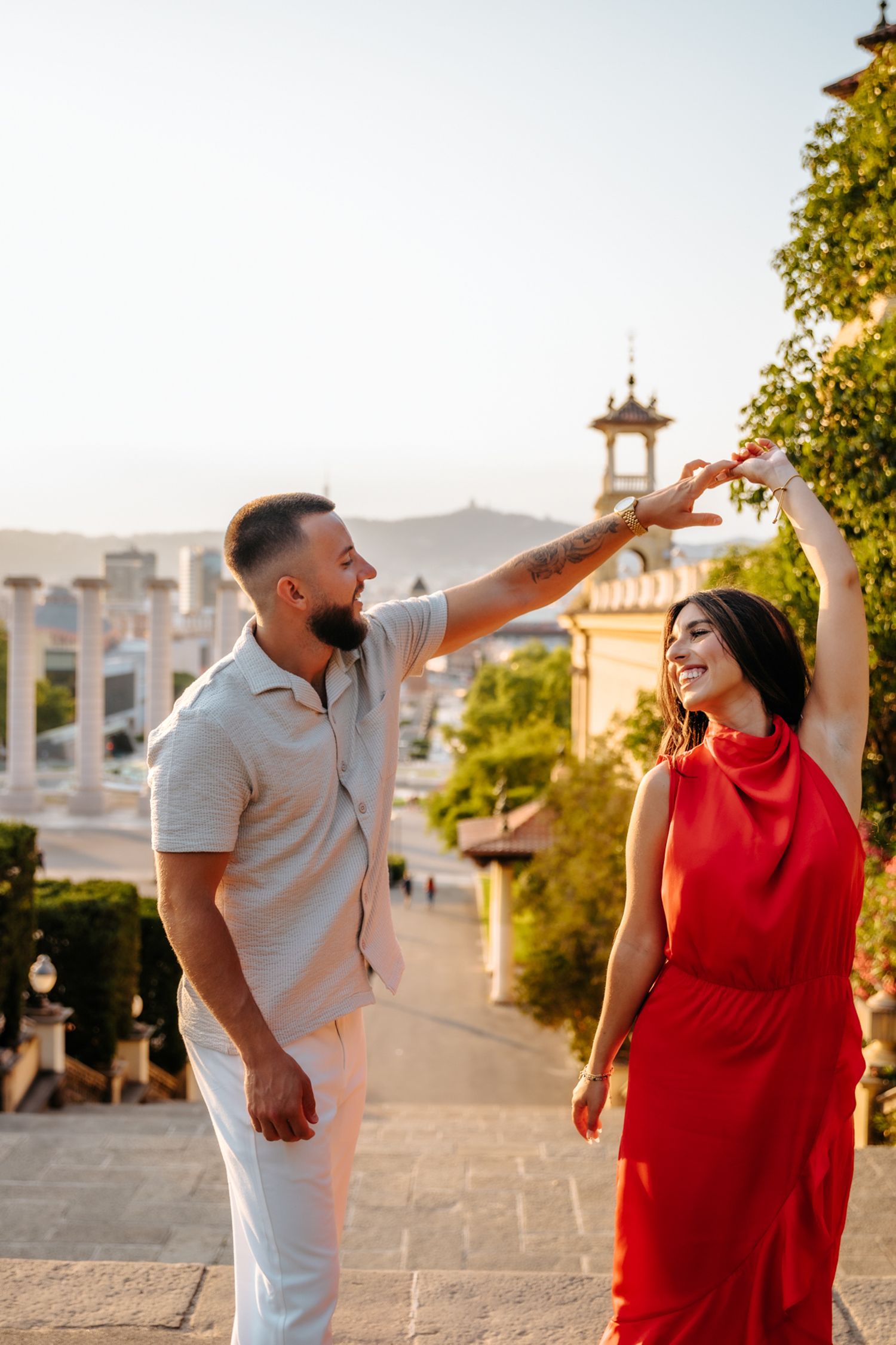 Ajla & Hako smiling together during their honeymoon photoshoot in Montjuïc, Barcelona.