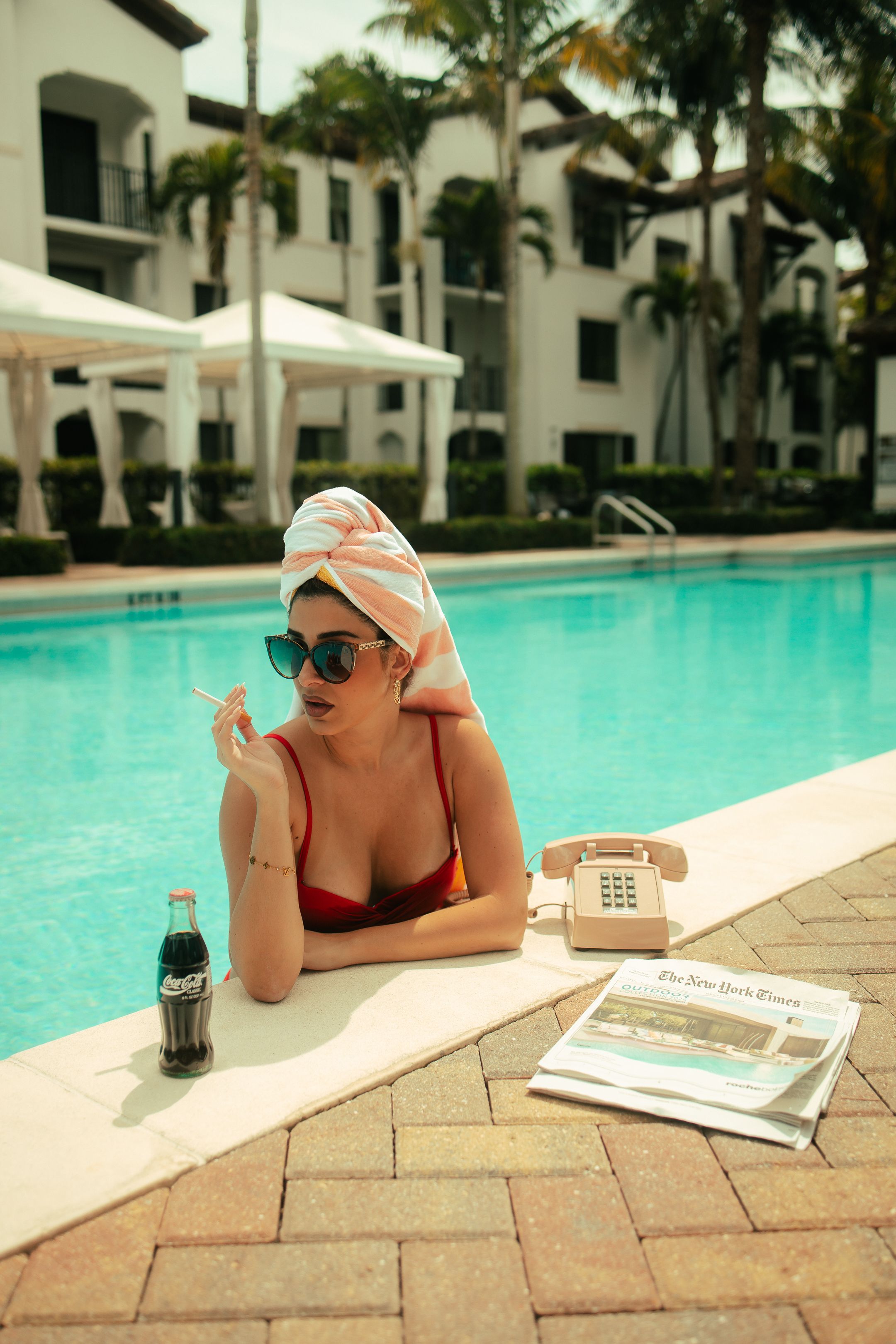 High-fashion lifestyle, Prada poolside energy, cinematic portrait photography, Pinterest summer moodboard aesthetic.