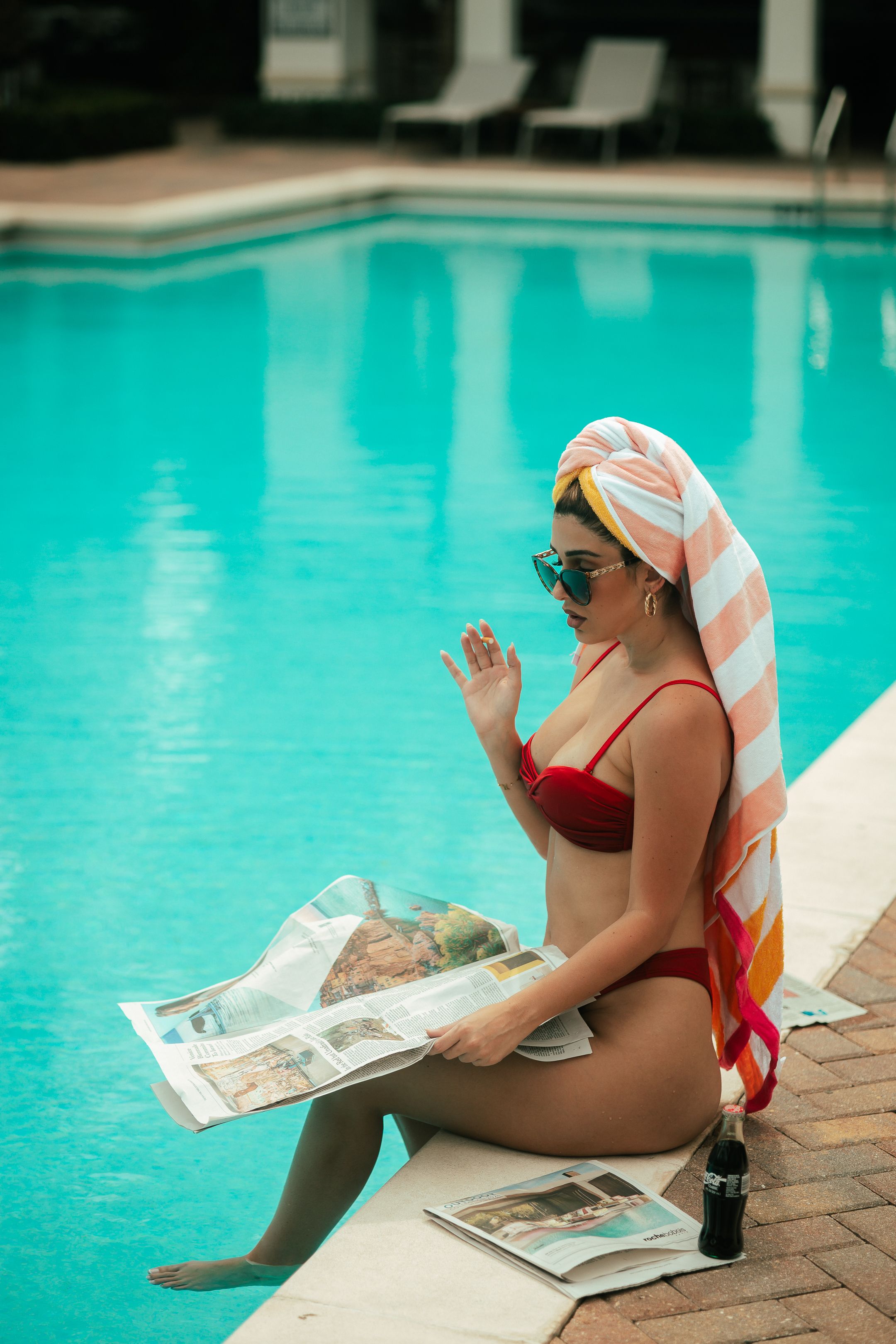 Cinematic editorial poolside, Chanel-inspired resort vibes, lifestyle portrait photography trending on Instagram & Pinterest.