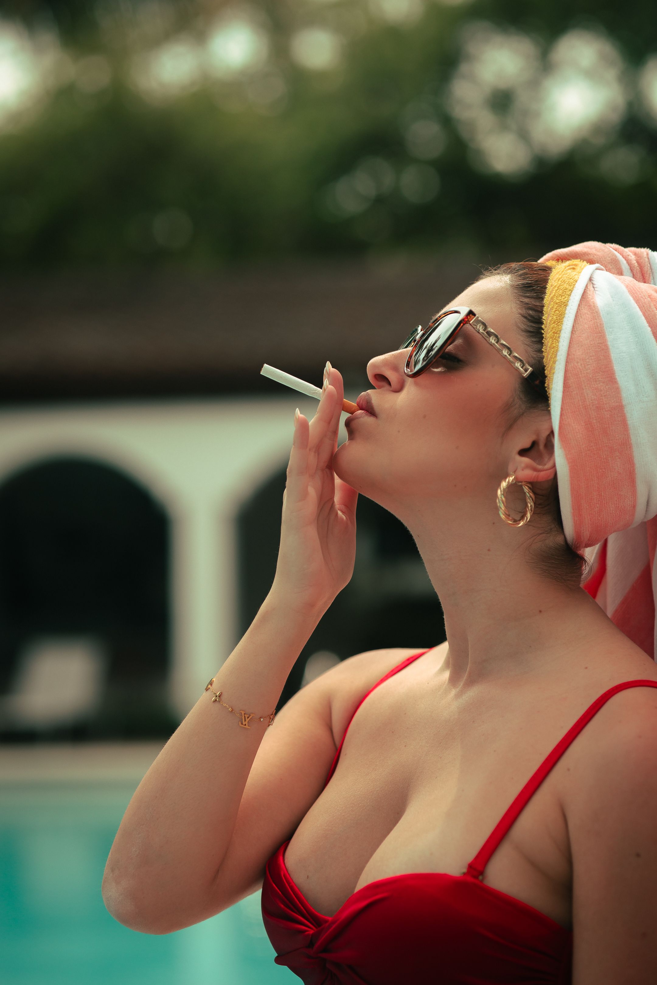 Luxury Dior x Gucci poolside editorial, Instagram-worthy cinematic fashion content by MannyPortraits.