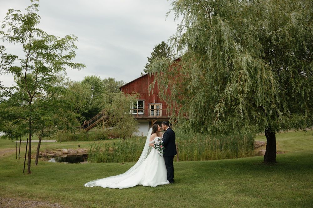 A series of romantic outdoor wedding photos showcasing a couple against rustic barn and garden backdrops.