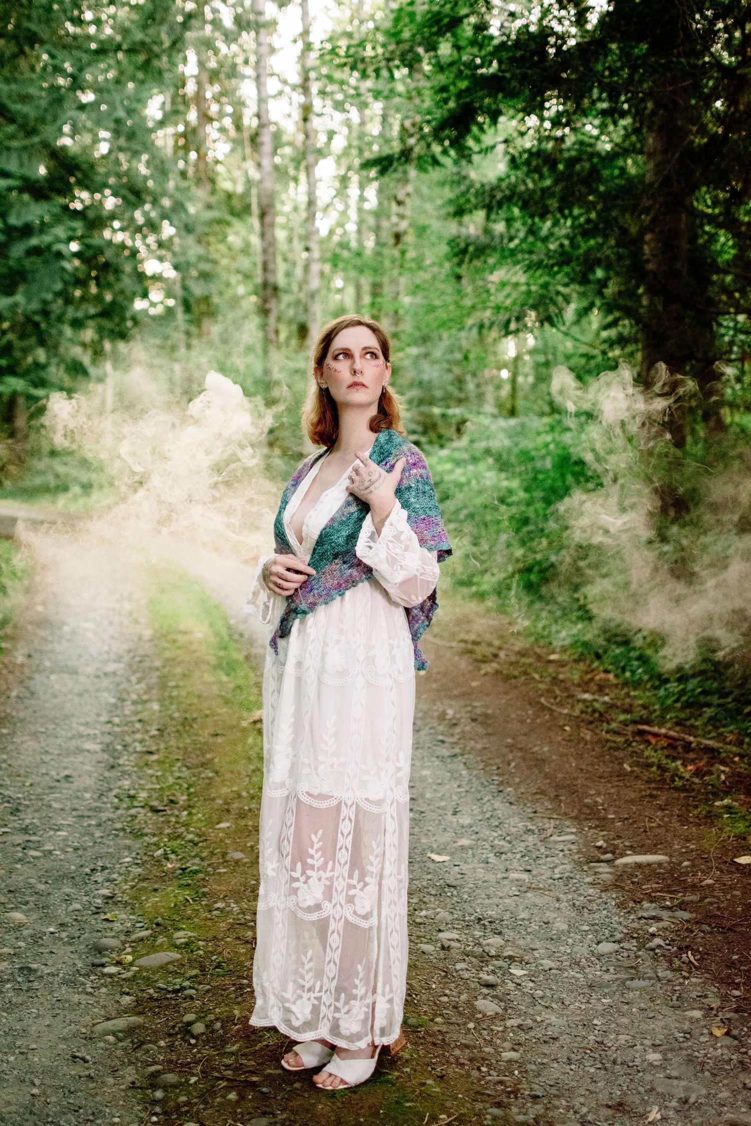 Model wearing lace gown with crochet shawl by Crocheted Chimerism in Monroe WA styled shoot.