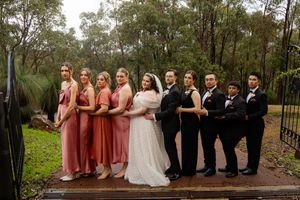 Wedding party prom posing for a fun and silly wedding photo