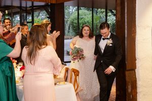 Newley weds making their entrance at the reception, wedding photographer Kirsten Graham.