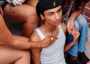 girls play with male models jewelry