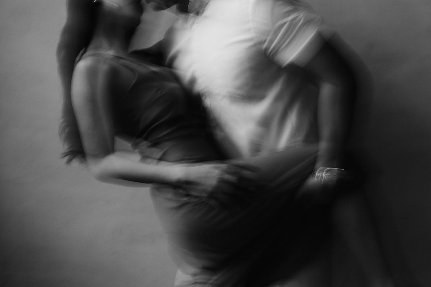 A series of black and white photographs showing dance movements in a graceful sequence.