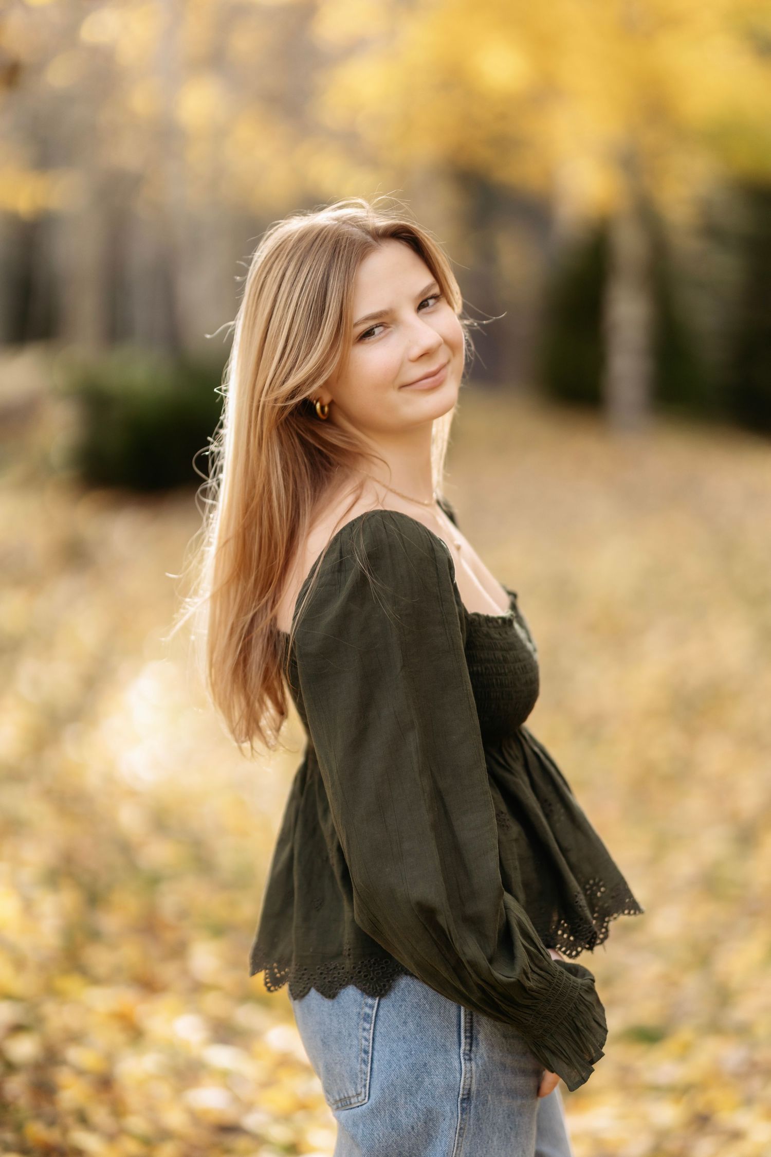High school senior smiling during Aspen senior photography shoot