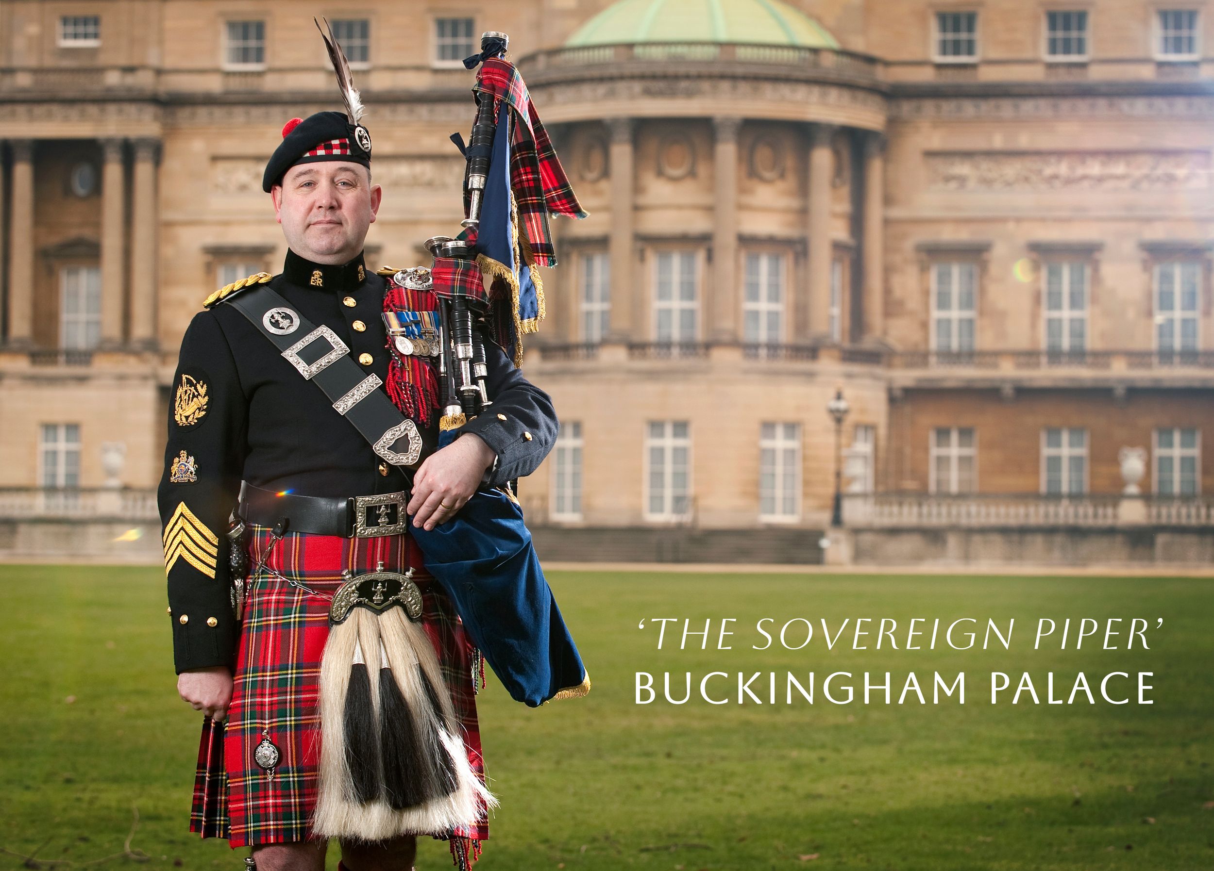 The Sovereign Piper in the garden of Buckingham Palace.