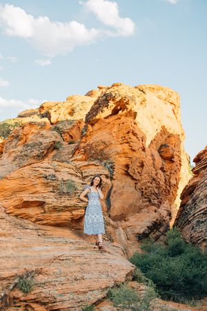 Beautiful desert landscape with red rock formations under blue sky.