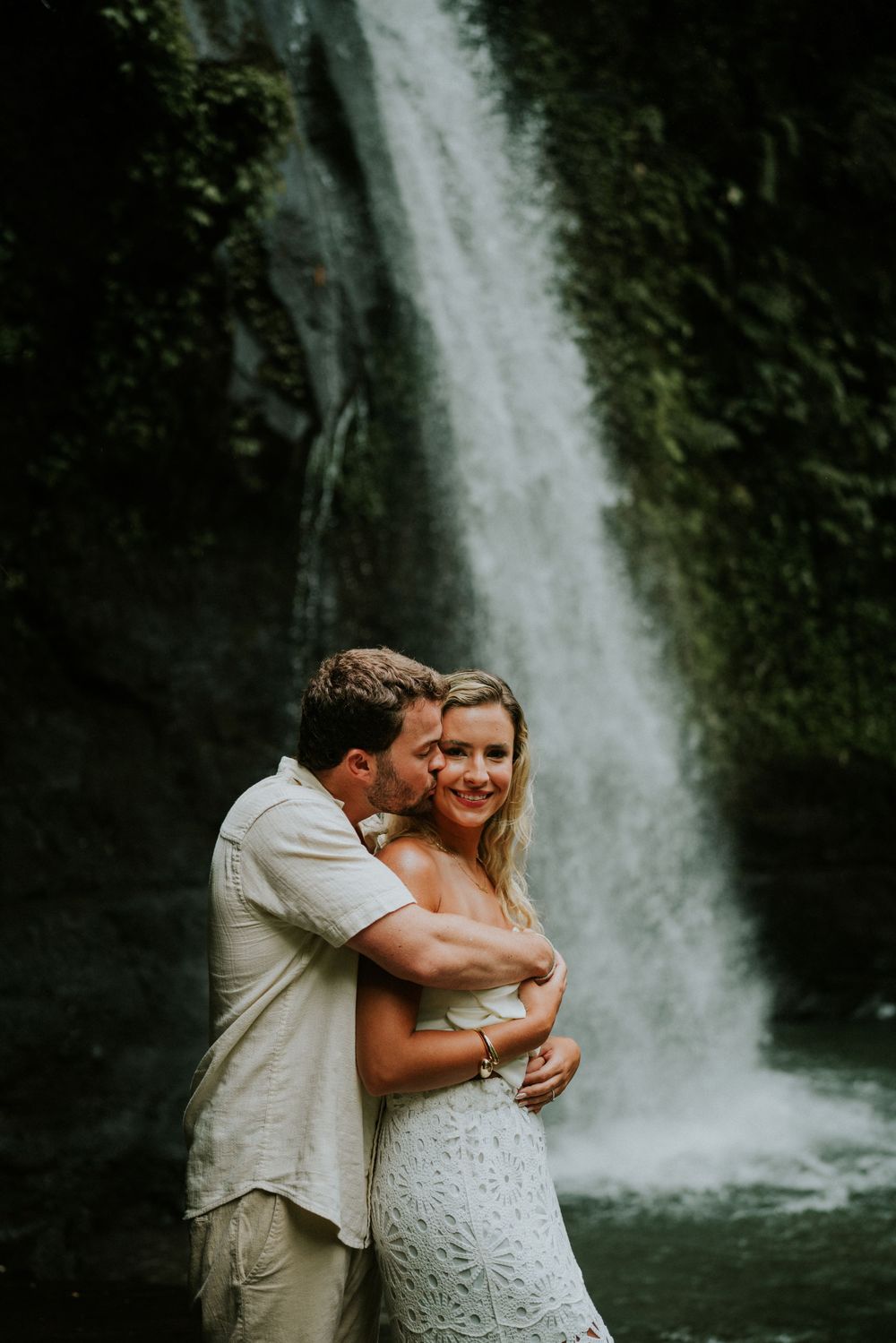Couple photoshoot session in Bali with waterfall background