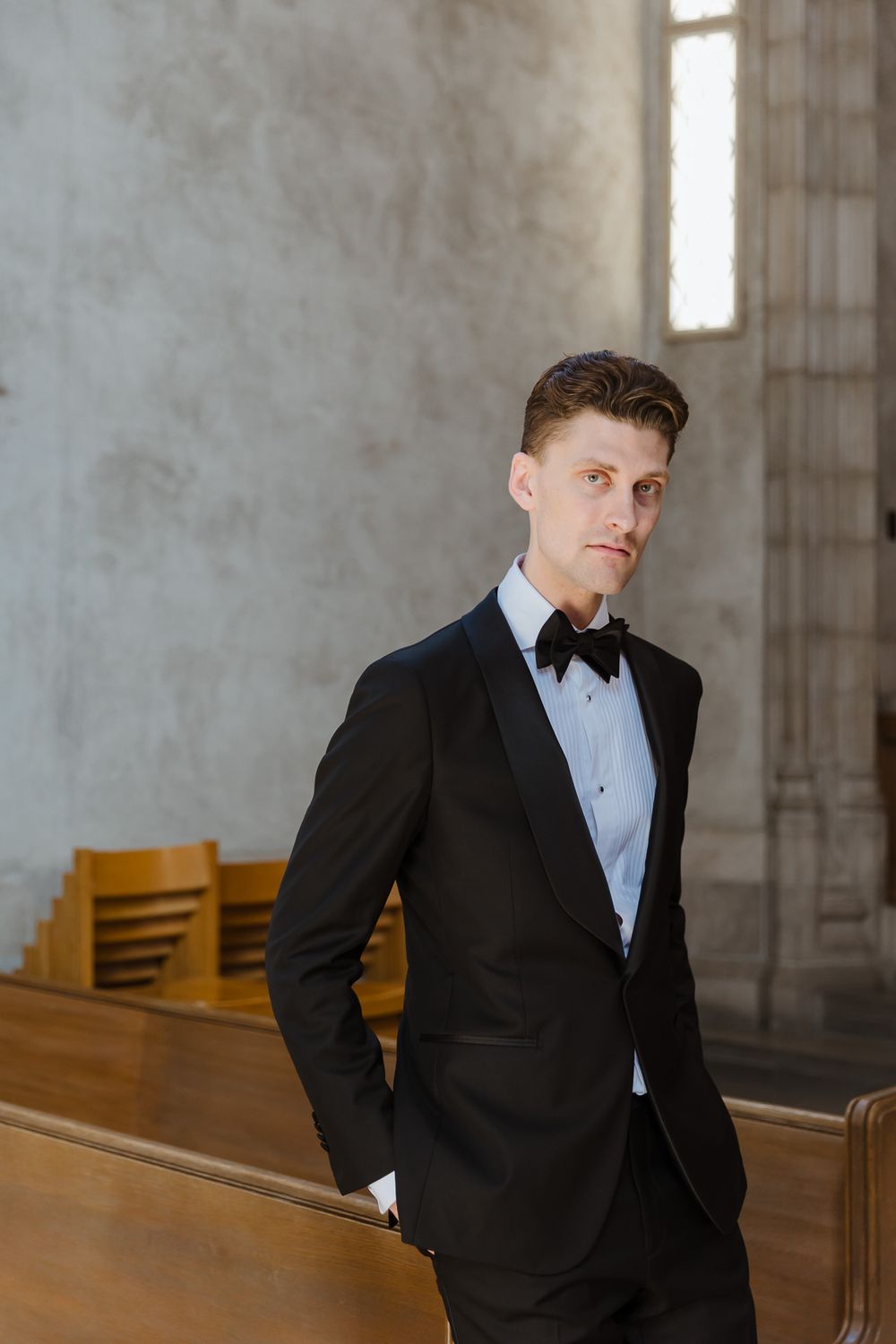 Emotional ceremony at Trinity College Chapel. Groom's portrait.