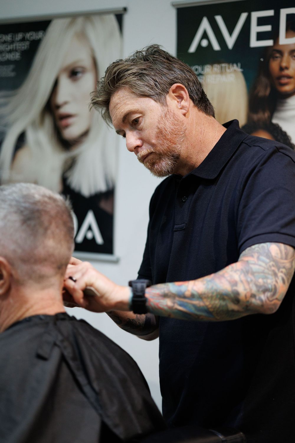 Professional hair coloring session in progress at upscale salon.