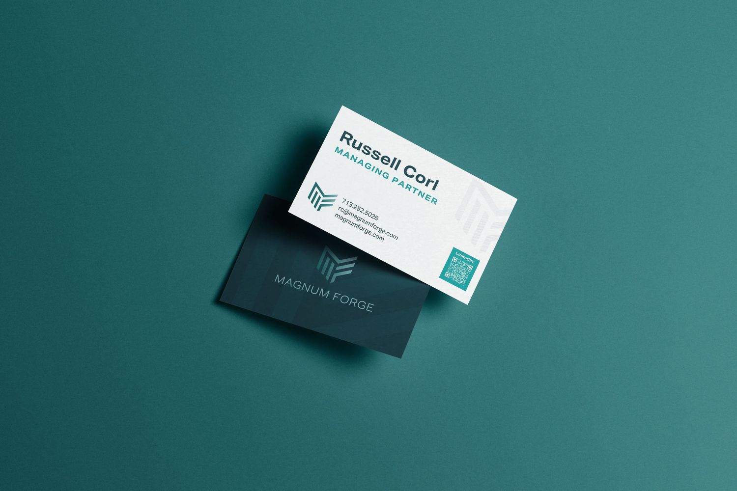 Business cards mockup with teal and white color scheme displayed on dark background.