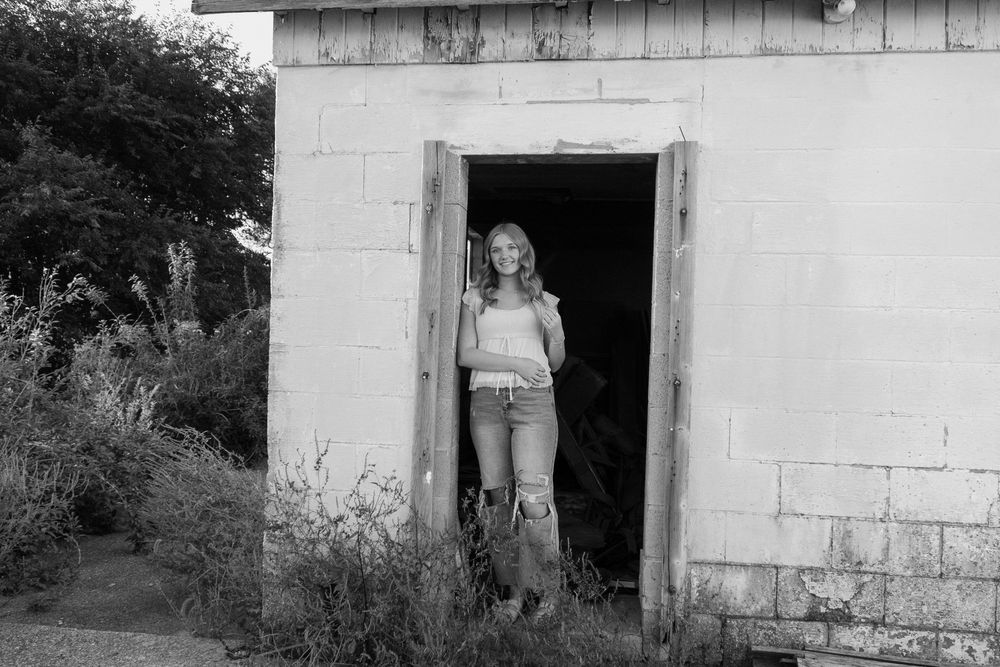 A series of five similar doorway shots showing someone standing in a white building entrance.