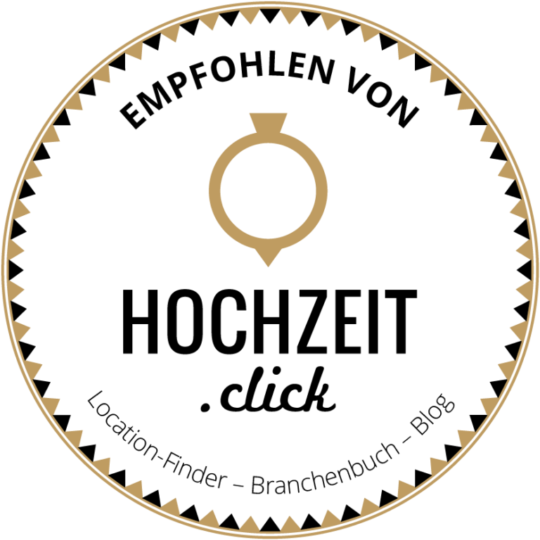 Circular black and gold logo badge for Hochzeit.click wedding location finder and industry directory service.